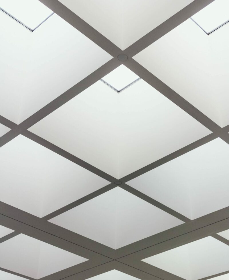 Professional Drop Ceiling Services by 127 Restoration grid ceiling with beautiful lighting
