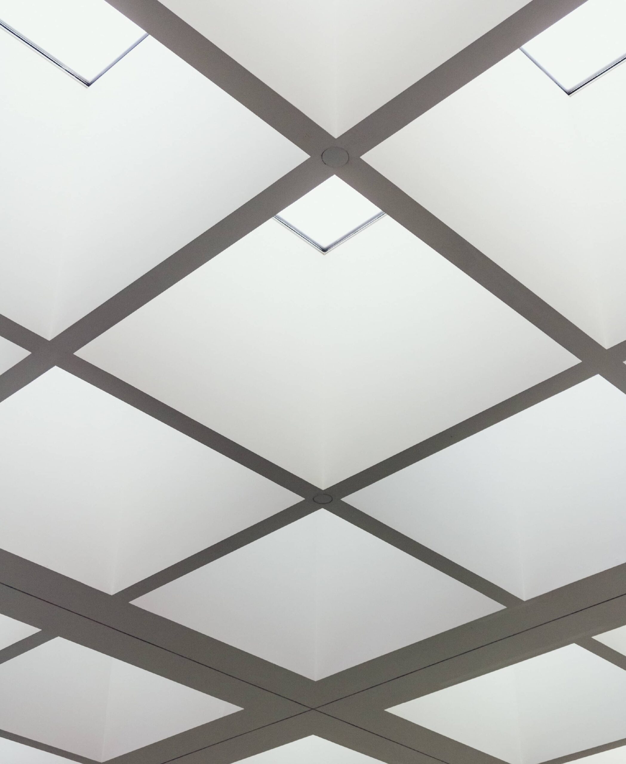 Professional Drop Ceiling Services by 127 Restoration grid ceiling with beautiful lighting